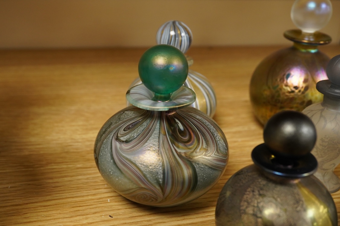 A collection of thirteen Isle of Wight scent bottles, tallest 15cm